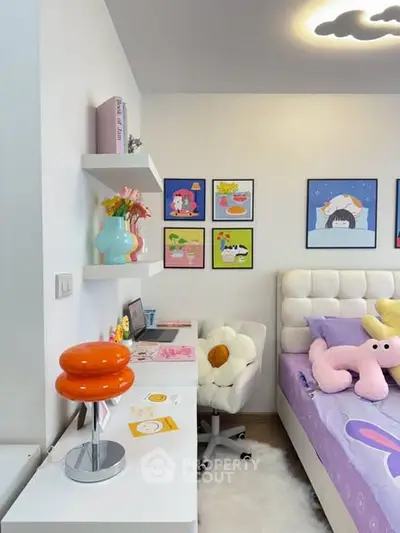 Charming bedroom with playful decor and cozy ambiance, perfect for a child's dream space.