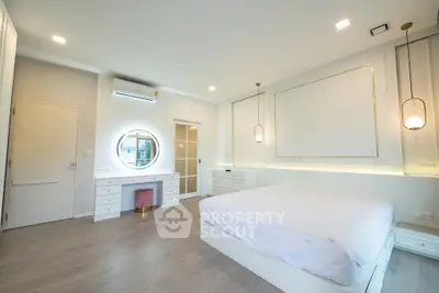 Luxurious modern bedroom with elegant decor and ambient lighting