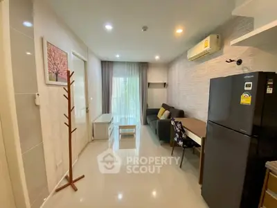 Modern living room with sleek furniture and air conditioning in a cozy apartment.