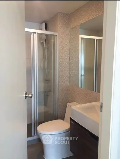 Modern bathroom with sleek shower and contemporary fixtures