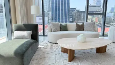 Luxurious modern living room with stunning city view and elegant furniture.