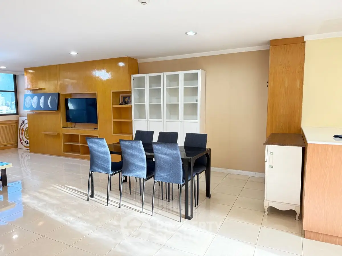 Spacious dining area with modern furniture and ample natural light