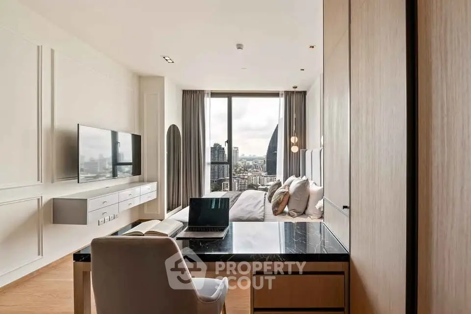 Modern bedroom with city view, sleek furniture, and stylish decor