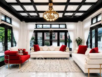 Luxurious living room with elegant chandelier and modern furniture