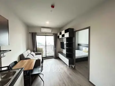 Modern apartment interior with open living area and balcony view