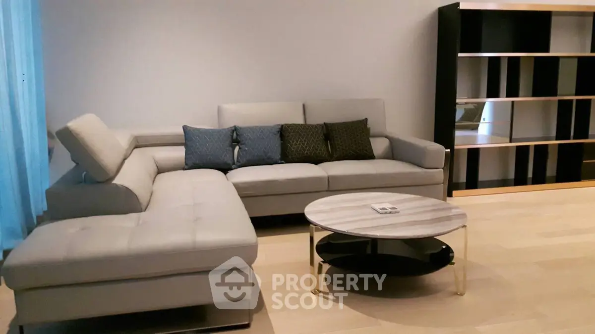 Modern living room with stylish sectional sofa and elegant coffee table