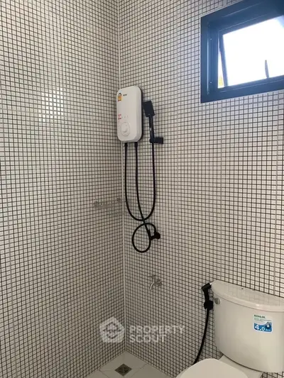 Modern bathroom with sleek shower and stylish tile design