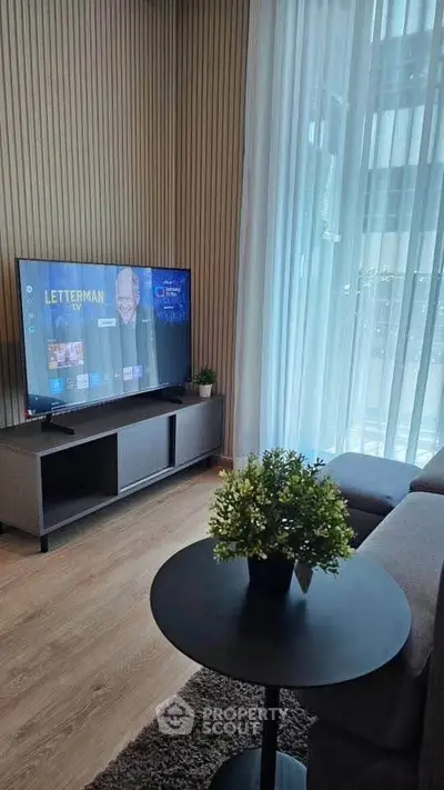 Modern living room with sleek TV setup and stylish decor