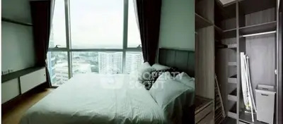 Modern bedroom with city view and spacious closet in high-rise apartment.