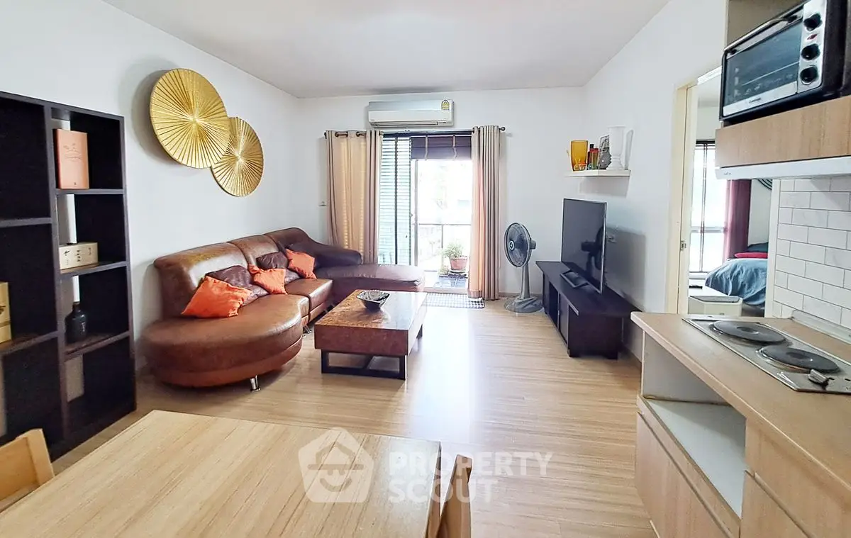 Spacious living room with modern decor and natural light