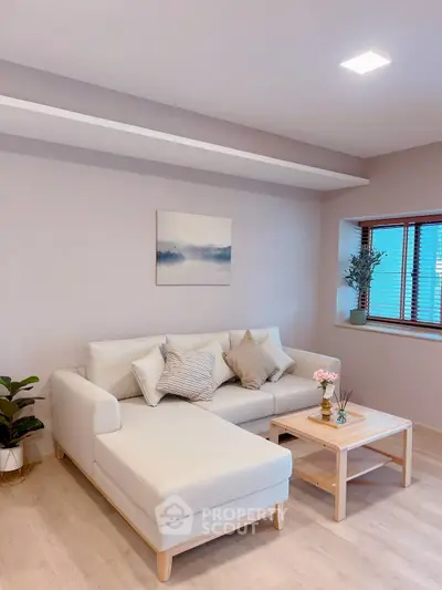 Modern living room with cozy sectional sofa and stylish decor