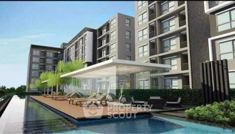 Modern apartment building with pool and outdoor lounge area
