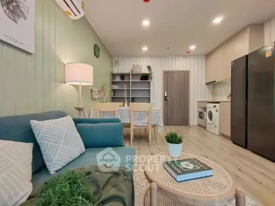 Charming open-plan living room with modern kitchen and cozy decor