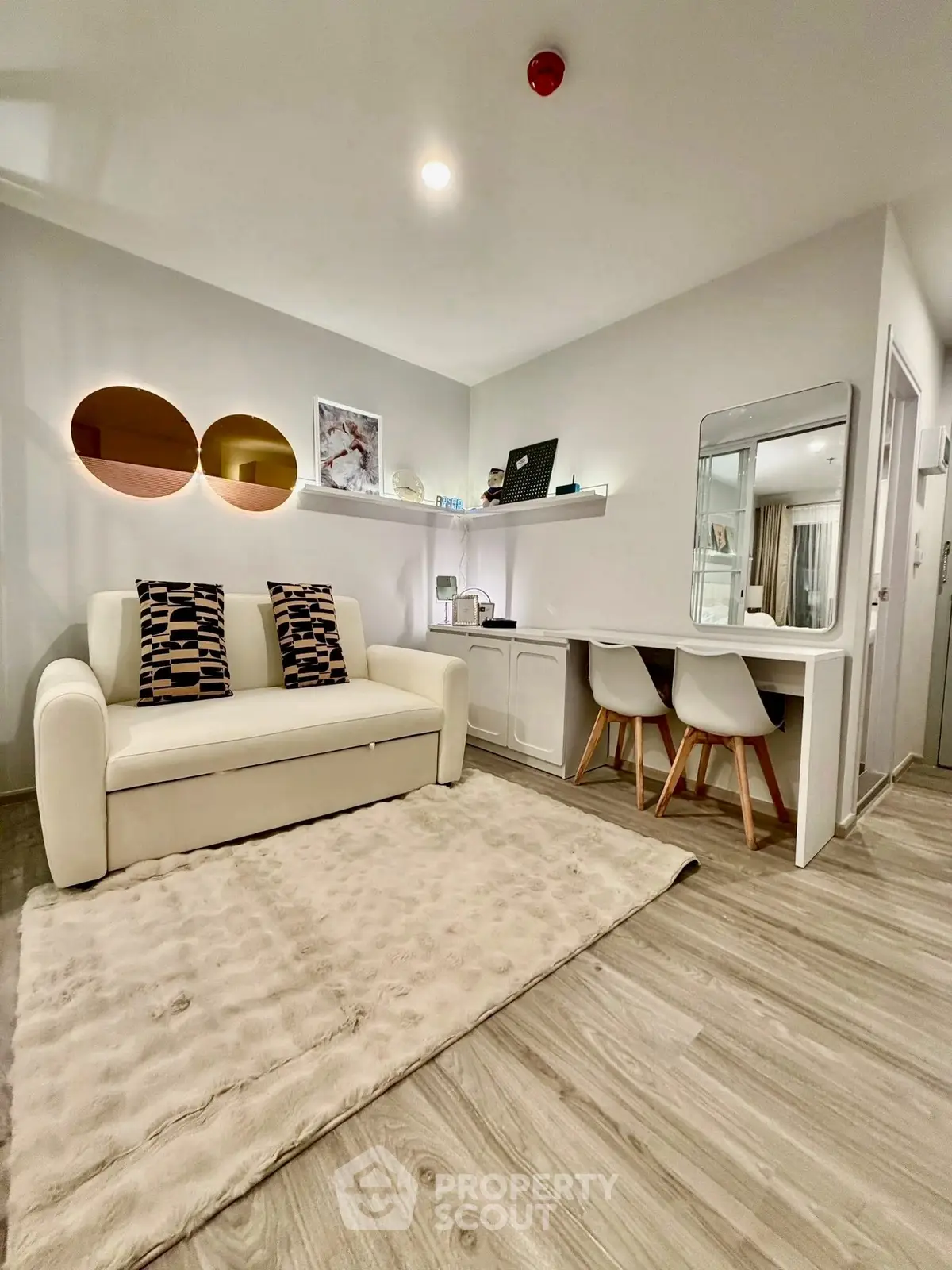 Modern living room with stylish decor and cozy seating area