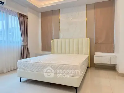 Luxurious bedroom with elegant design and natural light