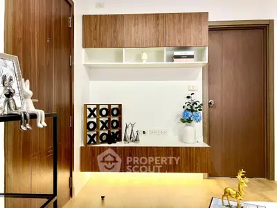 Stylish modern living room with wooden accents and decorative elements.