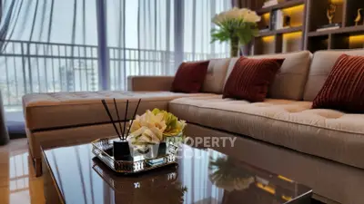 Luxurious living room with elegant sofa and stunning city view