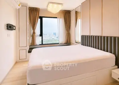 Luxurious bedroom with panoramic city view and elegant decor