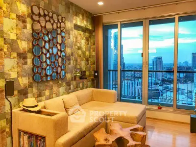 Stylish living room with unique wall art and stunning city view from balcony.