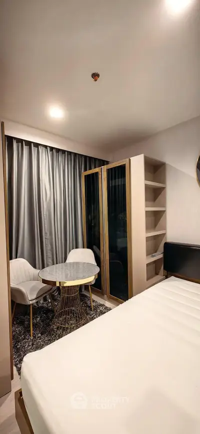 Modern bedroom with stylish furniture and elegant decor