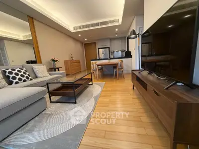 Spacious modern living room with open kitchen and stylish decor