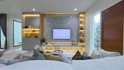 Luxurious modern living room with elegant lighting and stylish decor