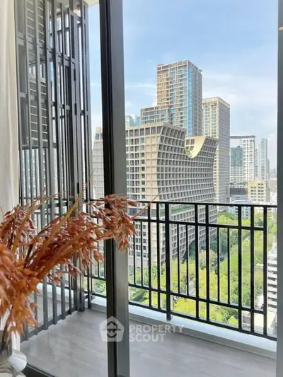 Modern balcony with stunning city view and high-rise buildings