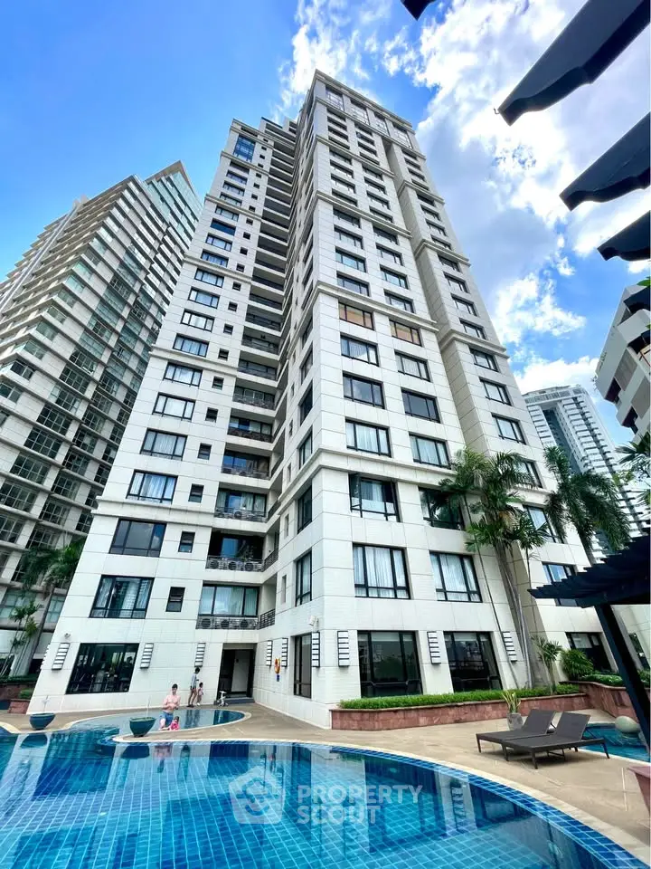 Luxurious high-rise condominium with pool and stunning city views