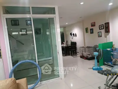 Spacious living area with modern decor and pet-friendly features, ideal for family gatherings.