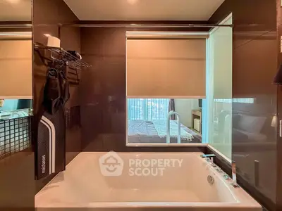 Luxurious bathroom with modern bathtub and large window view