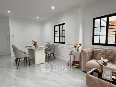 Elegant living room with chic furniture and marble flooring, perfect for modern living.