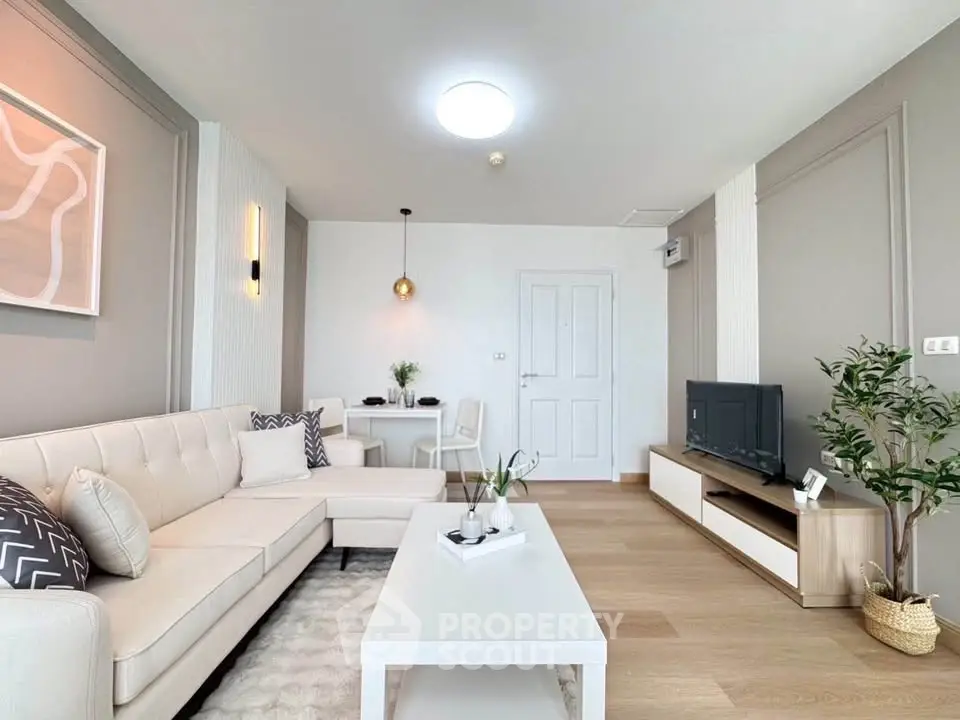 Modern living room with stylish decor and cozy seating area