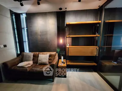 Modern living room with leather sofa and sleek shelving unit