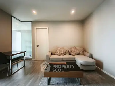 Modern living room with sleek furniture and cozy ambiance