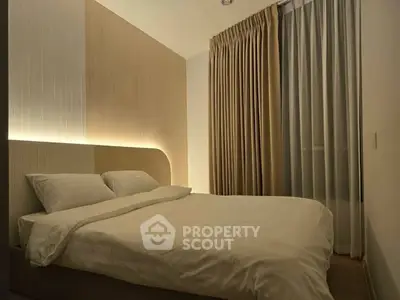 Cozy modern bedroom with ambient lighting and floor-to-ceiling curtains