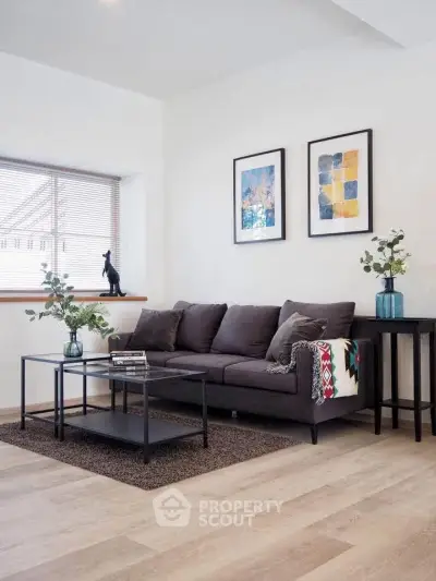 Modern living room with stylish decor and cozy seating area