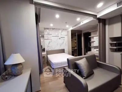 Modern studio apartment with stylish decor and cozy furnishings