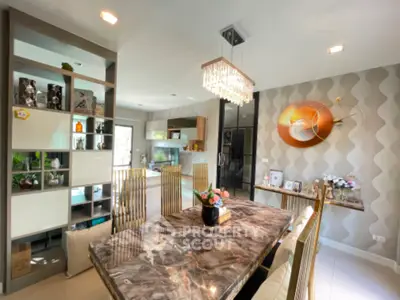 Luxurious dining area with elegant marble table and modern decor in a stylish home