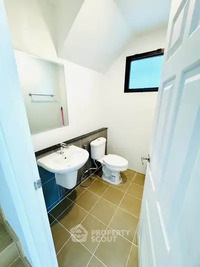 Modern bathroom with sleek fixtures and natural light