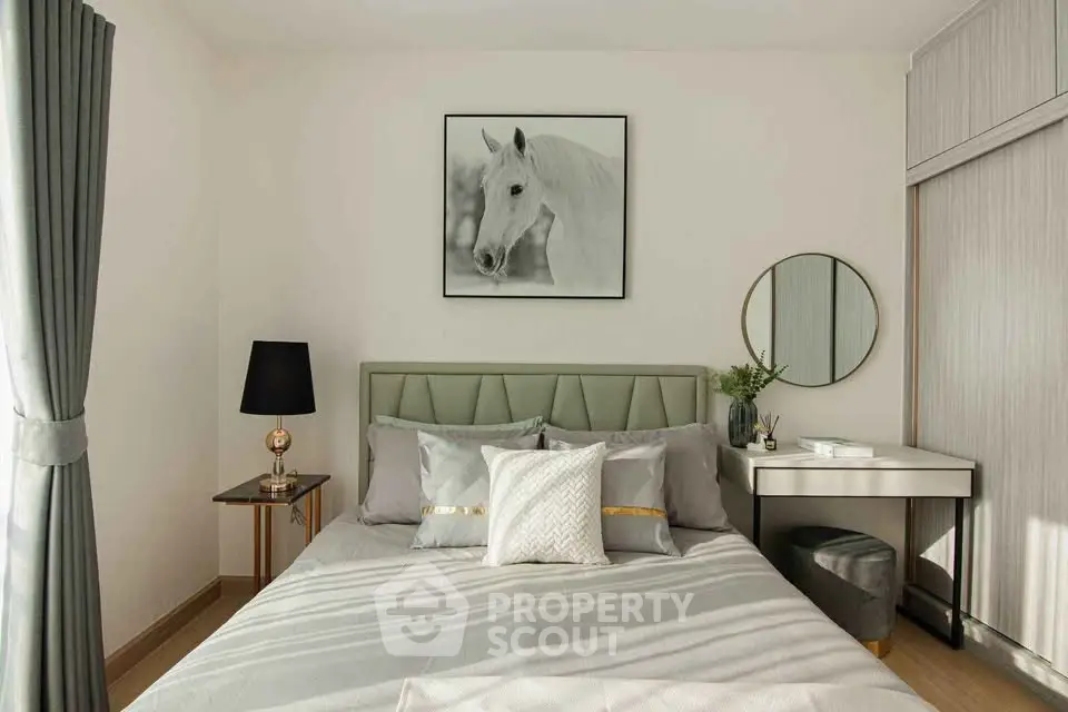 Modern bedroom with elegant decor, featuring a stylish bed, chic side tables, and a horse artwork on the wall.