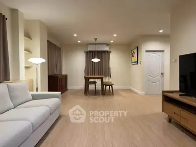 Spacious modern living room with elegant decor and natural lighting