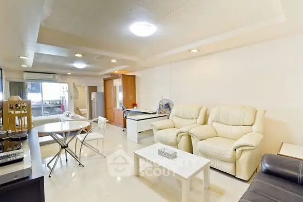 Spacious living room with modern furniture and open layout