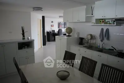 Modern kitchen with dining area and open layout in contemporary home