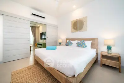 Modern bedroom with stylish decor and cozy ambiance, featuring a wooden bed and soft lighting.