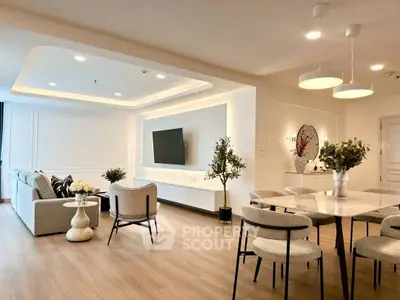 Spacious modern living room with elegant dining area and stylish decor