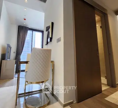 Modern study area with elegant chair and natural light