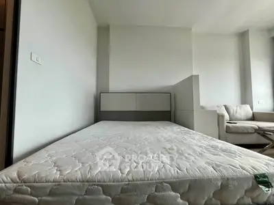 Modern bedroom with minimalist design and comfortable furnishings