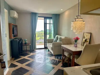 Stylish living room with modern decor and balcony view in a cozy apartment.