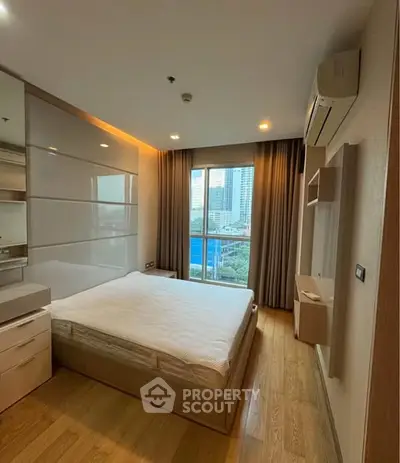 Modern bedroom with city view and sleek design