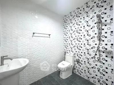 Modern bathroom with stylish tile design and sleek fixtures
